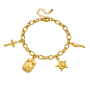 Golden stainless steel charm bracelet with cross, sun, and starfish on white background