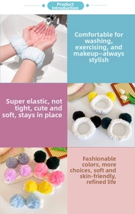 Detail of soft microfiber spa headbands and wristbands with colorful plush pom-poms