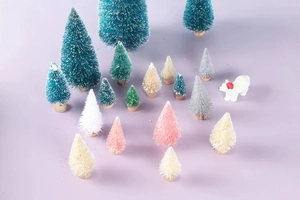 Detailed view of assorted mini sisal Christmas trees in multi-colors and sizes