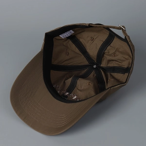 Brown quick-dry baseball cap with internal stitching details and metal buckle strap