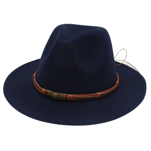 Detail of navy wool felt fedora featuring a vintage skull buckle and brown leather band