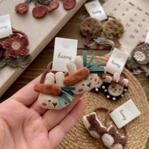 Cute bunny and floral elastic hair ties for girls in warm autumn knit style