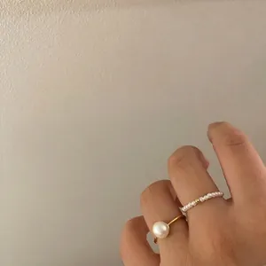 French retro style elastic pearl ring set with large freshwater pearl and gold band