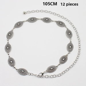 Detailed view of 105cm silver butterfly chain belt with 12 vintage oval floral links