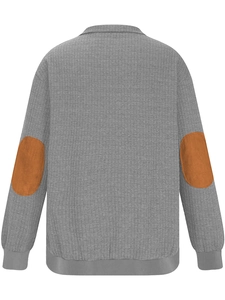 Detailed back view of a grey sweater featuring brown oval elbow patches on sleeves
