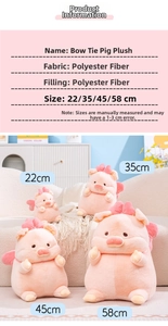 Pink plush pig collection with bows in four sizes from 22cm to 58cm on a beige sofa