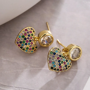 Elegant 18K gold plated heart drop earrings with colorful zircon stones on grey fabric