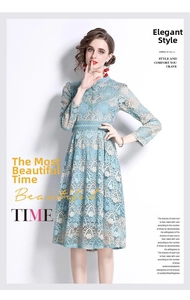 Close-up of intricate floral crochet texture and delicate lace embroidery on light blue dress