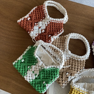 Detailed top view of handmade macrame bags with woven texture and cotton drawstring liner