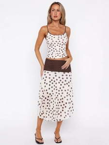 Polka dot two-piece set featuring a cropped camisole top and high-waist A-line midi skirt