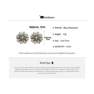 Detail view of rhinestone flower earrings showing 3cm size and 13g weight specifications
