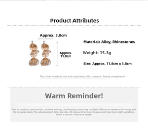 Detailed specs of gold long tassel earrings with dimensions 11.8cm by 3.8cm