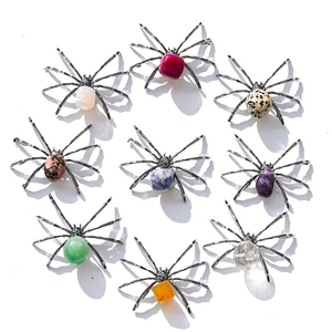 Artistic spider figurines featuring colorful natural crystal stones and metal legs