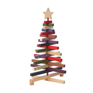 Rotating wooden Christmas tree ornament with colorful stacked bars and star topper