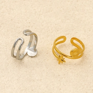 Minimalist adjustable open rings in gold and silver with star and sun disk charms