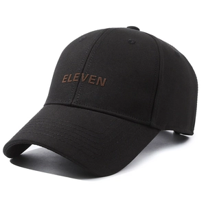 Black cotton baseball cap with ELEVEN letter embroidery shown in 45-degree side view