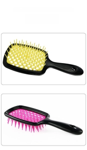 Hollow vented detangling hair brush with ergonomic handle for quick blow-drying and styling