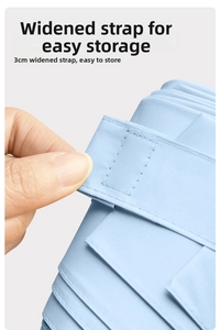 Detail of light blue sun umbrella showing a 3cm wide strap with high-density fabric texture