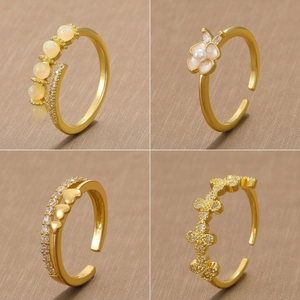 Adjustable gold rings with opal and flower designs in a four-grid product showcase