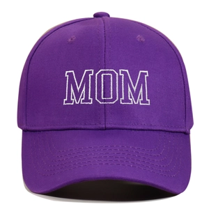 Close-up of white MOM embroidery on a dark purple cotton twill baseball cap