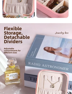 Pink portable jewelry box detailing removable dividers and velvet ring storage slots