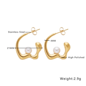 Detailed view of 21mm polished gold stainless steel earrings with pearl inlay