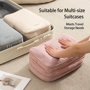 Sac de rangement compressé rose pour valise de voyage avec fermeture et poignée