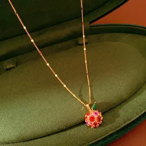 Exquisite 14k gold plated necklace featuring a zircon apple pendant on a fine gold chain