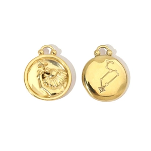 Detail of 14K gold plated stainless steel Leo zodiac charm pendant showing both sides