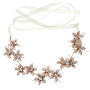 Exotic bridal gold floral headband with rhinestones and beige ribbons for wedding