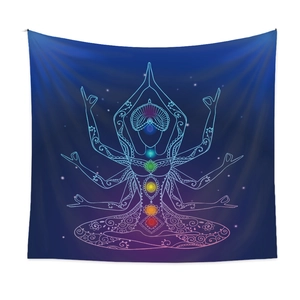 Detail view of yoga meditation tapestry with 7 chakras and star sky pattern decoration
