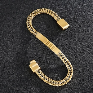 Men's gold stainless steel wheat chain bracelet with magnetic clasp on black leather