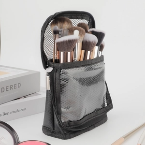 Vertical makeup brush organizer bag with black mesh and chic snakeskin detail