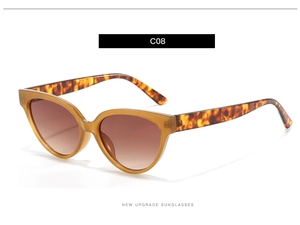 Detail of tortoise shell cat eye sunglasses frame with brown gradient lenses for women