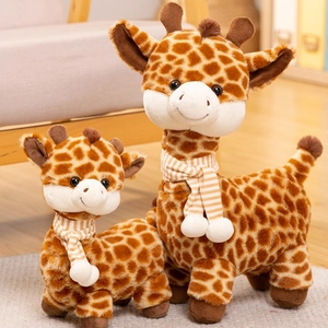 Close-up of two plush giraffes with striped scarves and detailed soft fur texture