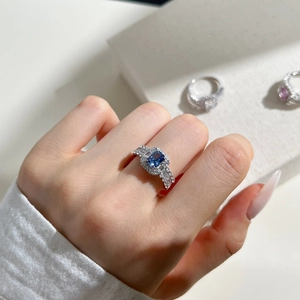 Detail of S925 silver ring featuring a blue heart-shaped ice-cut zircon with micro-pave