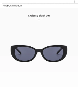Detailed close-up of bright black cat-eye sunglasses with dark grey lenses and C01 model mark
