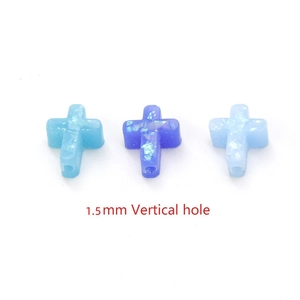 Synthetic opal cross beads in light and dark blue with 1.5mm vertical drill hole
