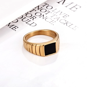 Luxurious 14k gold-plated signet ring with square black inlay and vertical stripe details