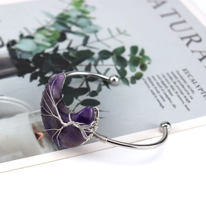 Detailed wire-wrapped silver crescent moon bracelet with purple amethyst gemstone