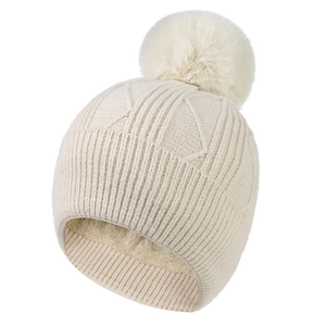 Bonnet en maille pour femme avec pompon en fausse fourrure et doublure polaire chaude