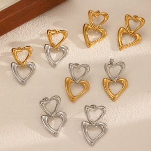 Elegant double heart stainless steel earrings in gold, silver, and two-tone finishes
