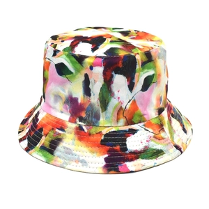 Detailed view of colorful graffiti art print on durable canvas sun bucket hat