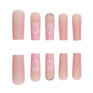 Pink matte long coffin press-on nails set with smiley face and rhinestone accents