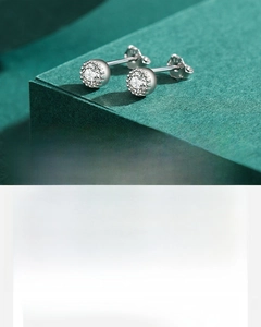 Macro shot of 5A cubic zirconia silver studs with handcrafted bead borders
