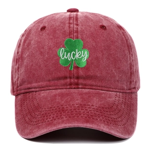 Washed burgundy cotton baseball cap with green lucky shamrock leaf embroidery