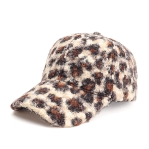 Detailed view of leopard print baseball cap in thick faux shearling fleece material