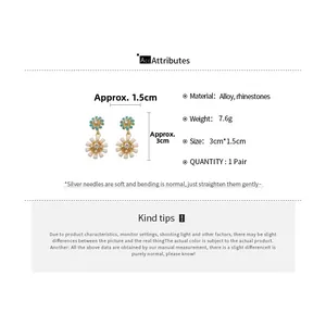 Detailed view of daisy drop earrings with dimensions of 3cm by 1.5cm and silver pins