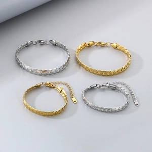 Golden and silver flat Cuban chain bracelets set in polished stainless steel for men and women