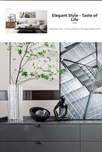 Close-up of Nordic black abstract thinker sculpture and circular resin home decor